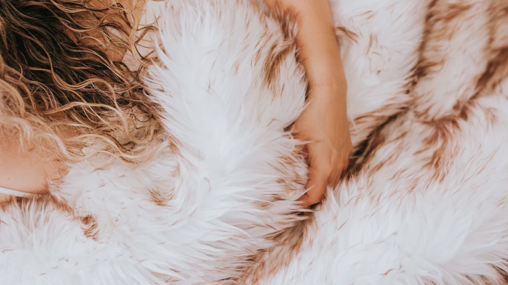 Woman on Faux Fur Squirt Blanket