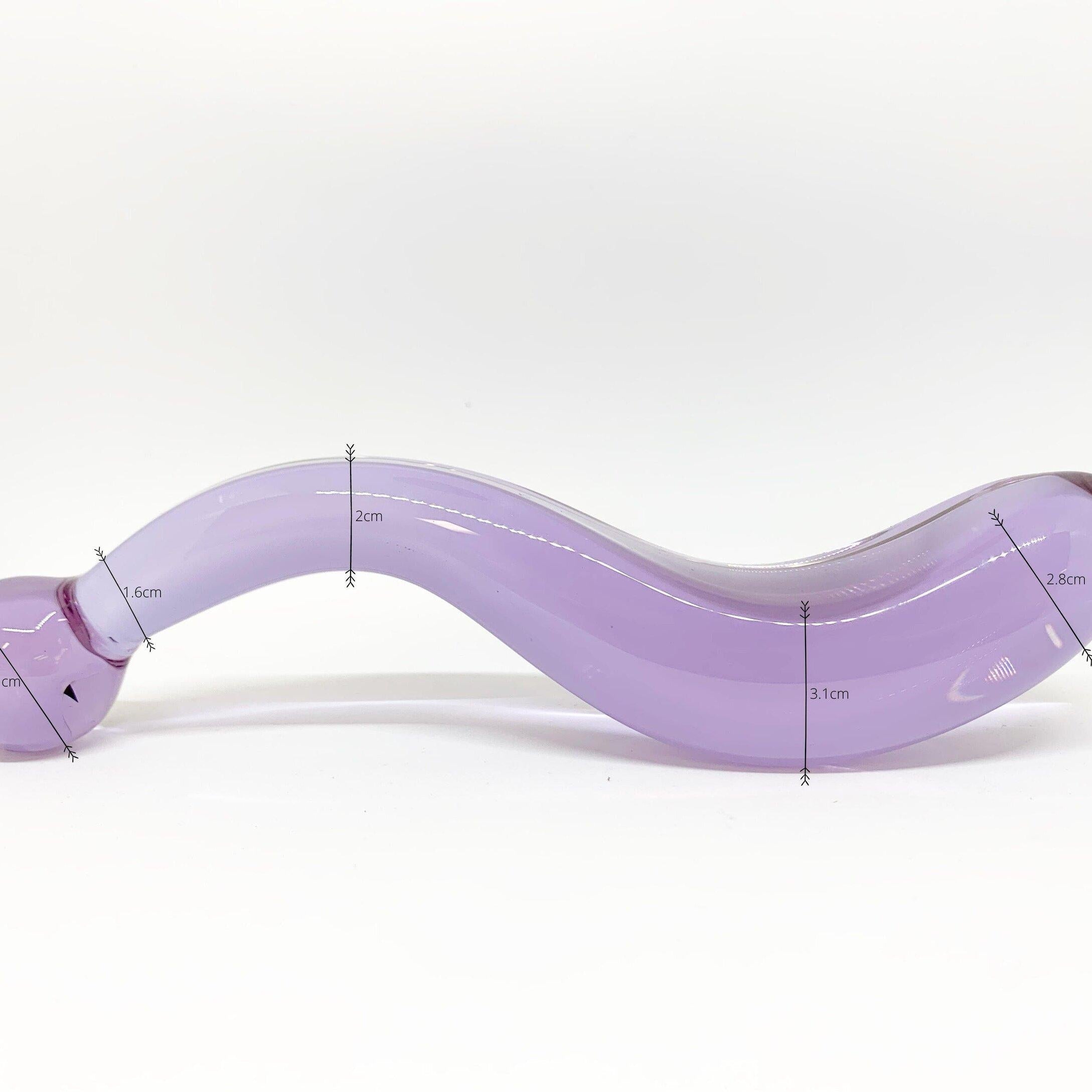 Pussy paddle thick curved pleasure wand in lilac. Pictured on white background with dimensions labeled.