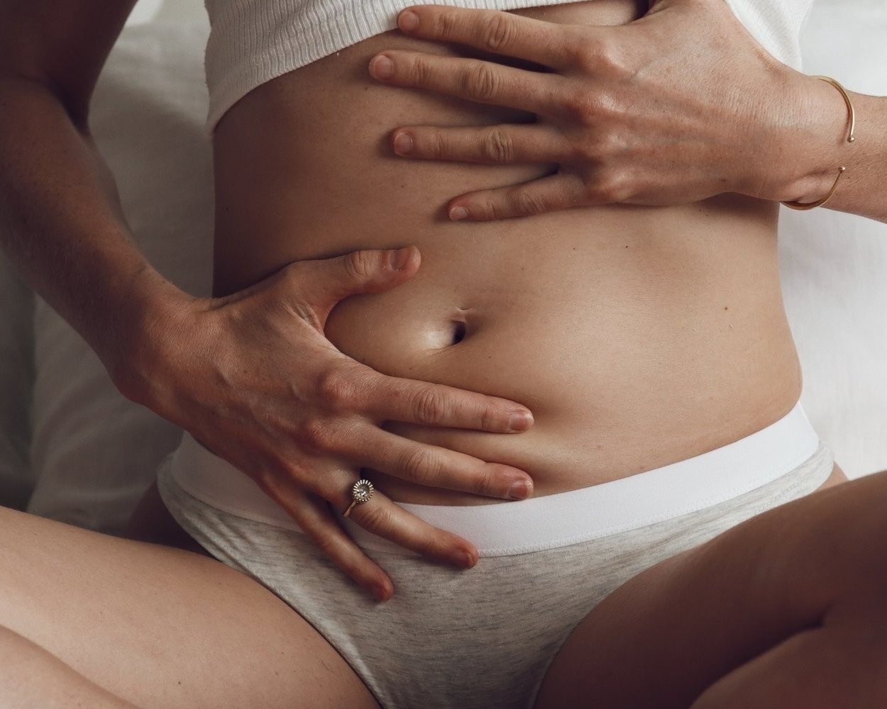 Woman holding womb