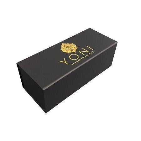 Black box packaging with gold branding on white background.